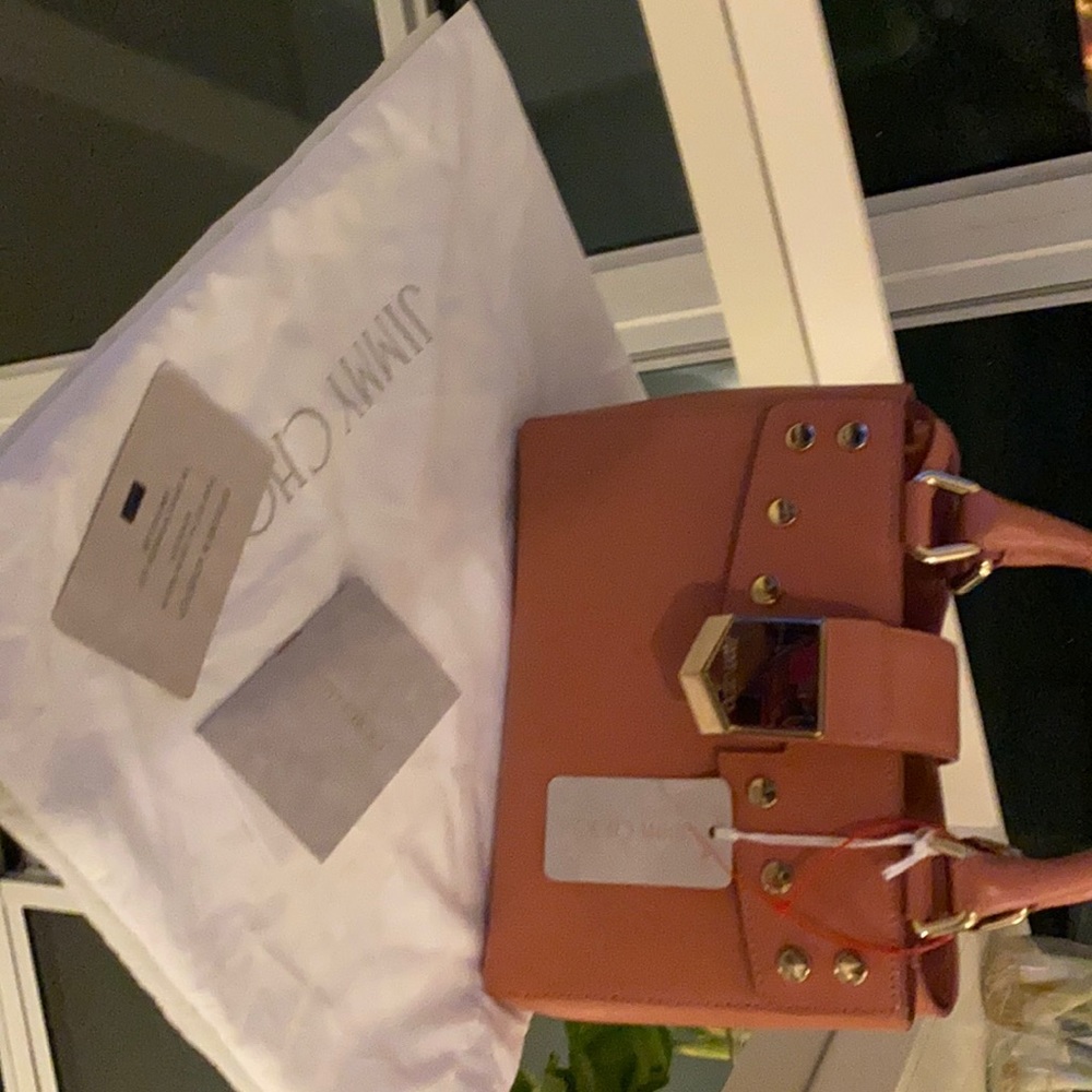 New Luxury Jimmy Choo calf leather handbag with original tag.